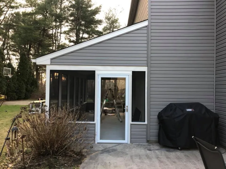 new addition screened porch side after