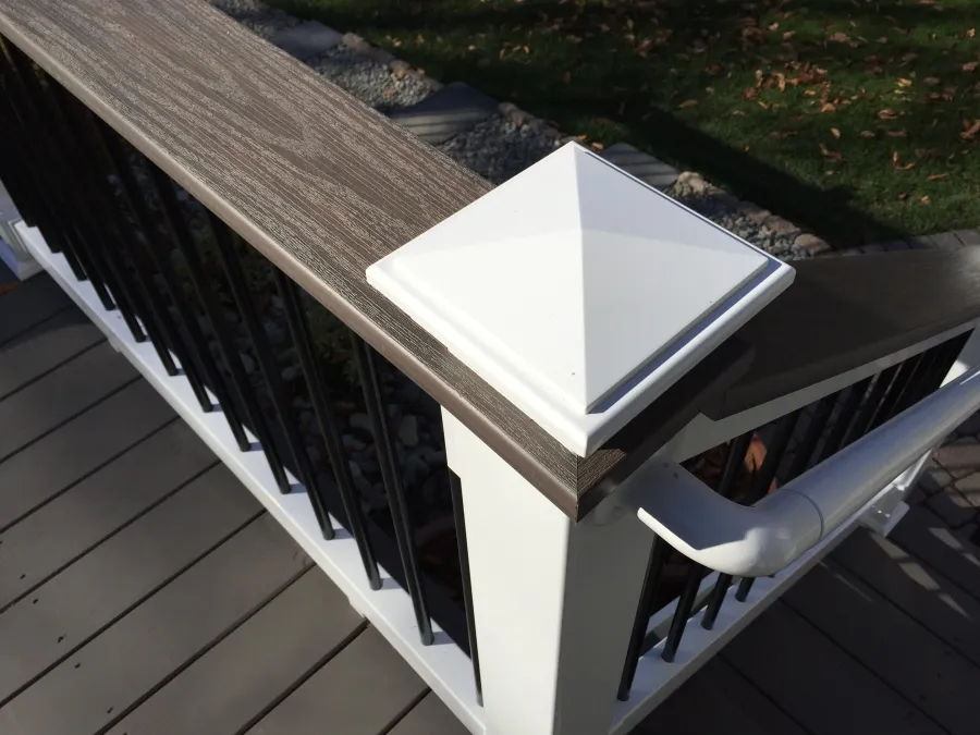 new composite deck dark white railings black spindles white post cap