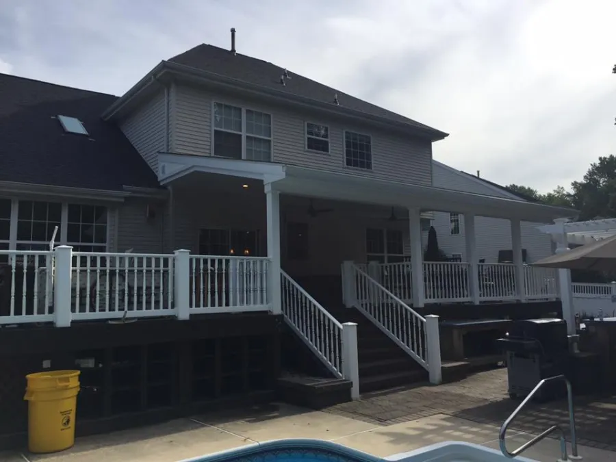 new composite deck tan decking white lattice covered porch concrete pool deck1