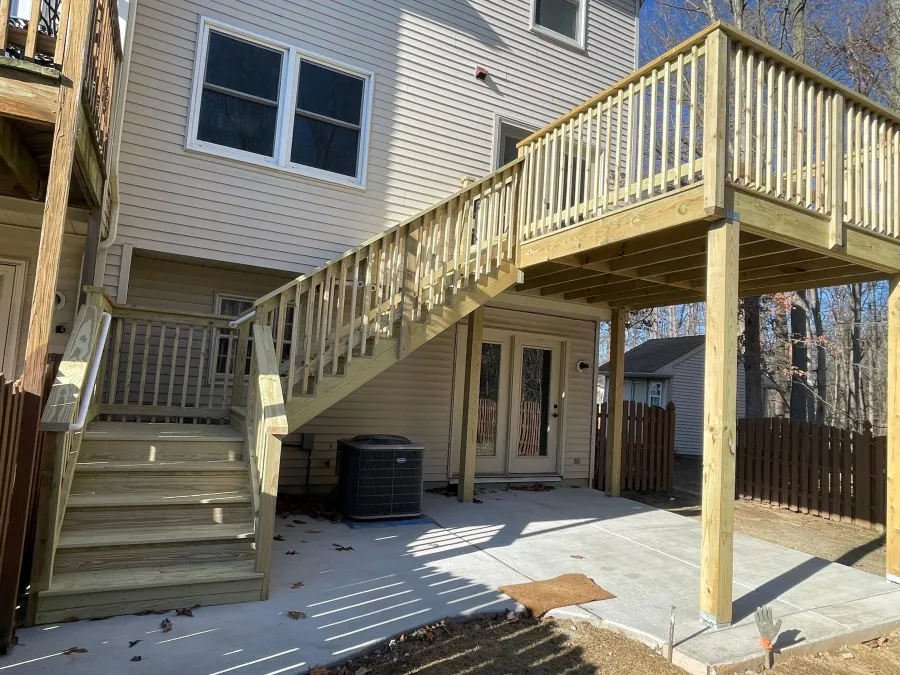 new second story wood deck concrete patio