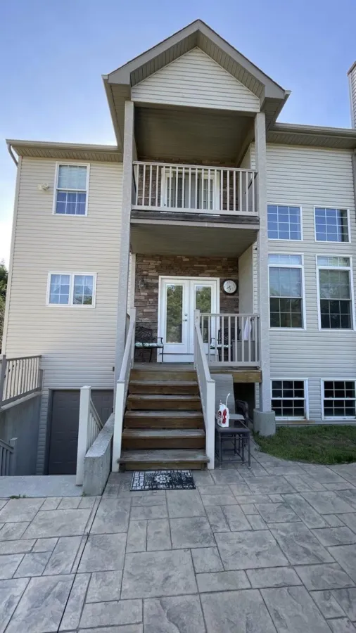 new small back deck and stairs stamped concrete patio1