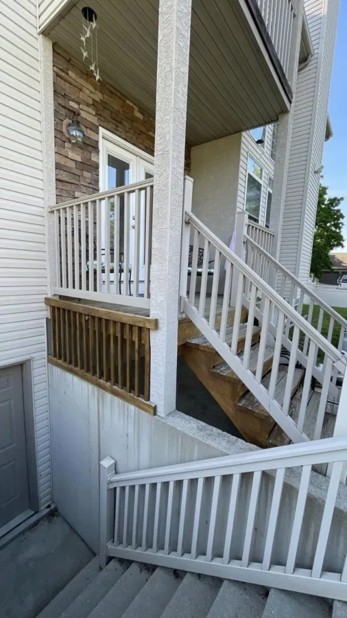 new small back deck and stairs stamped concrete patio3