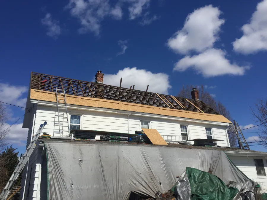 complete roof replacement tear off progess picture