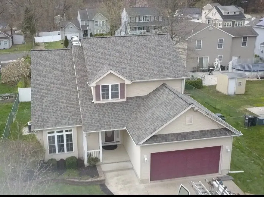 new roof replacement mulit level light gray three demnsional shingle