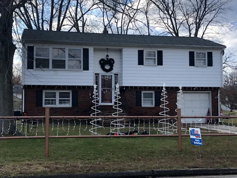 new roof replacement spilt level white siding