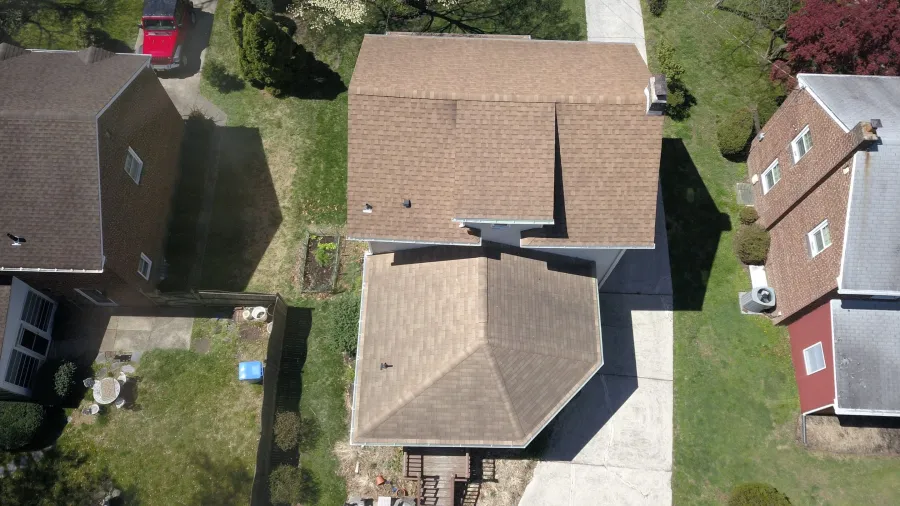 roof replacement brown shingles porch