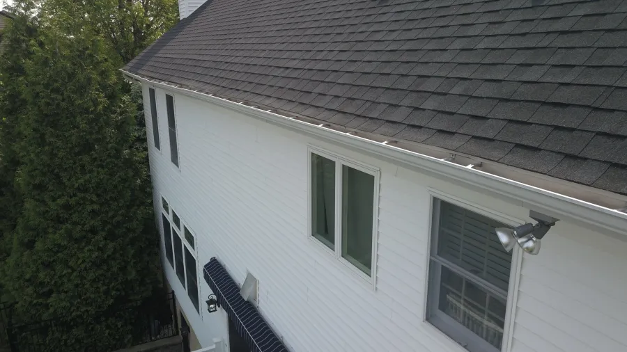 white vinyl siding gray shingles