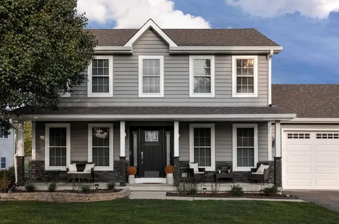 new siding entry door windows stone work porch