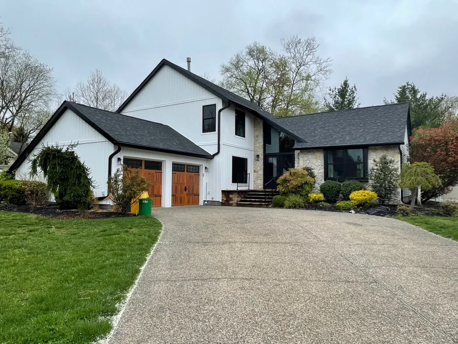 new vertical siding replacement white replacement roof black shingles new garage door