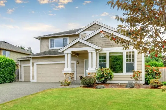 siding replacement windows garage door tan house