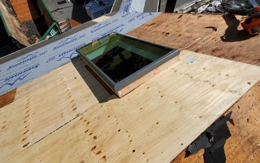 new roof replacement skylight installation