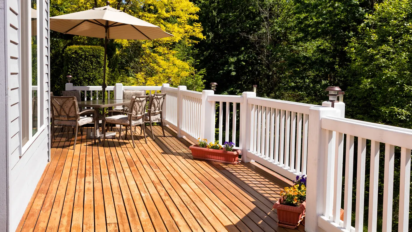 A brown deck with white railings in Blackwood, NJ, by Ameritech Services
