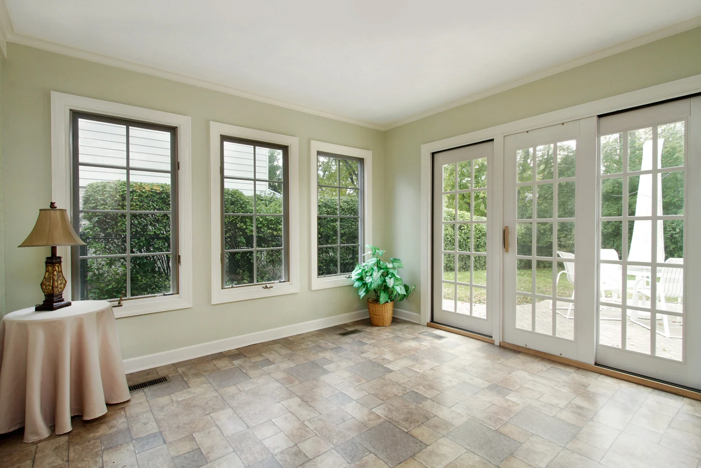 The interior of a home with white walls and newly replaced windows