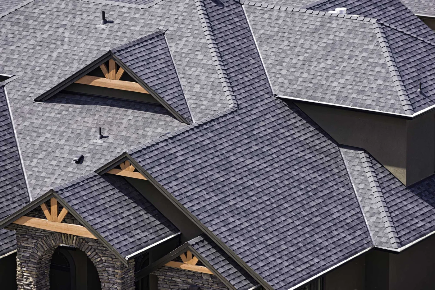 An overhead photo of a home with a recently replaced gray-colored roof