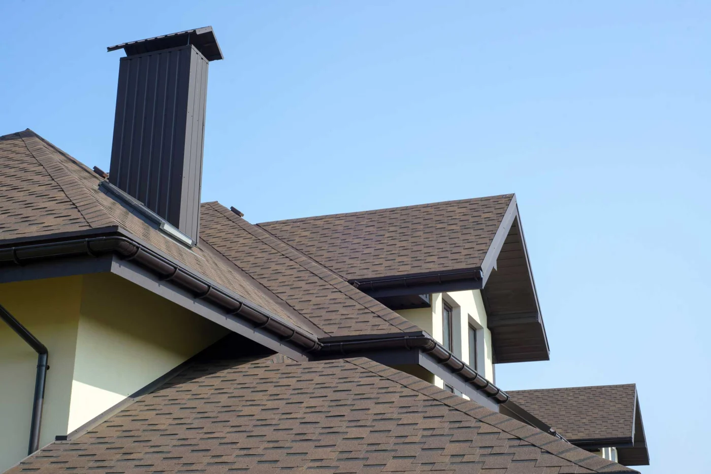 A newly installed brown colored roof on a home