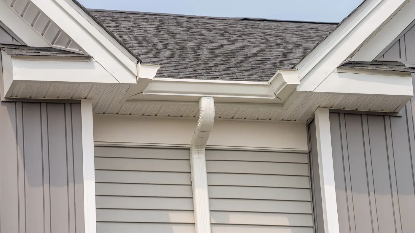 A closeup of a white downspout in Swedesboro, NJ, by Ameritech Services