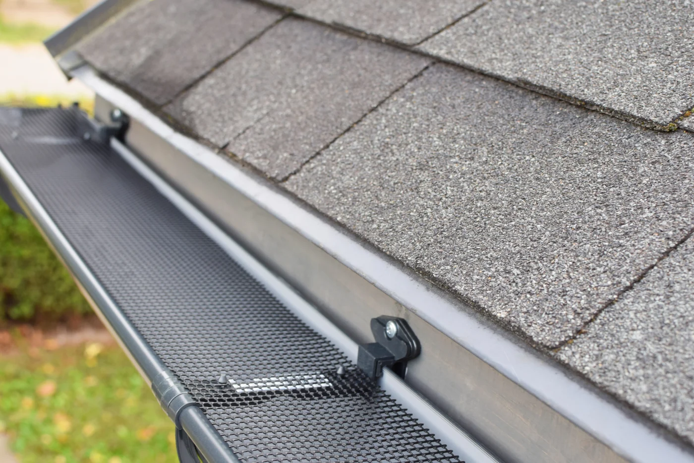 Gutters with gutter guards installed on the roof of a home with Ameritech Services of Mount Laurel, NJ