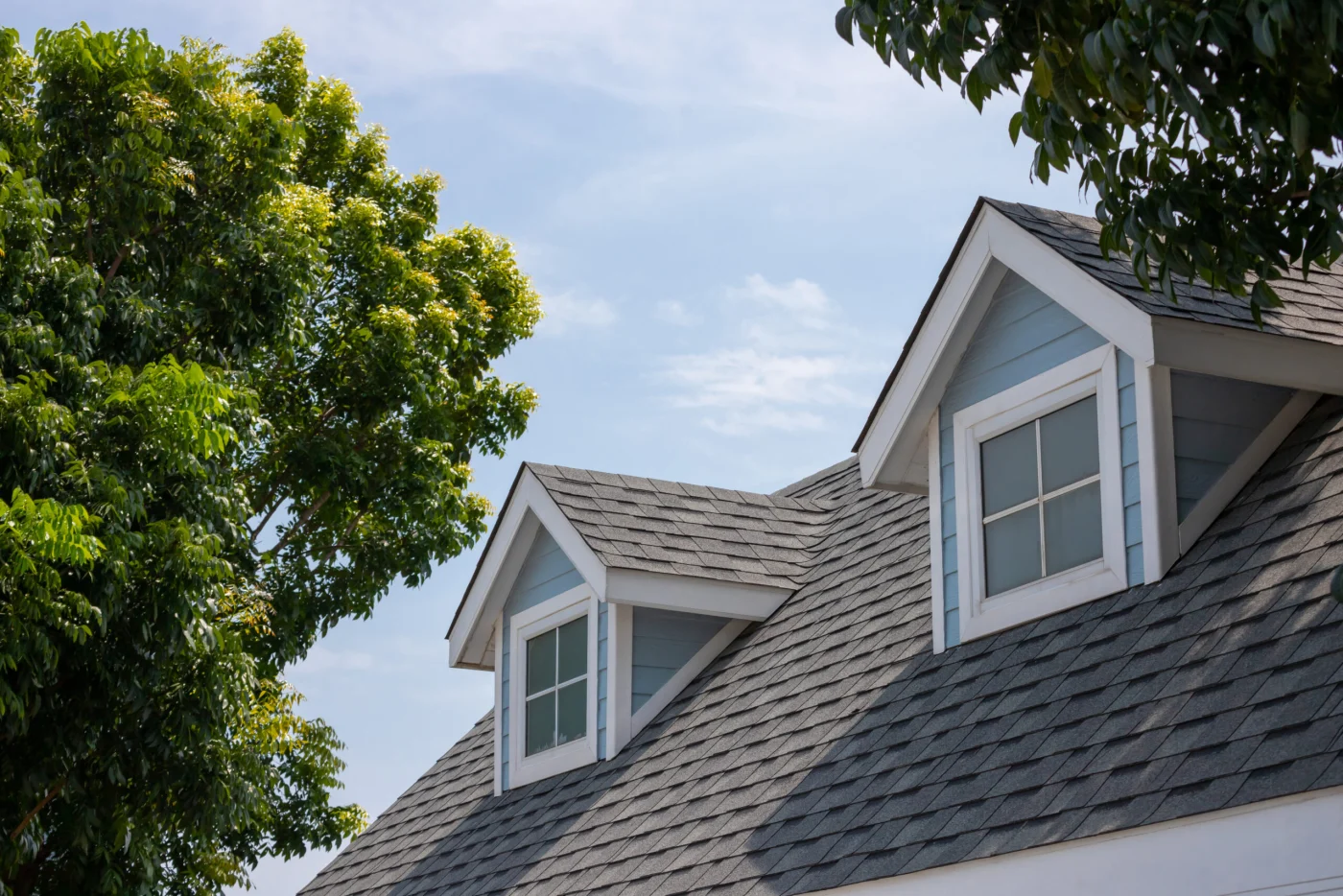 A gray home with recent home improvement services done