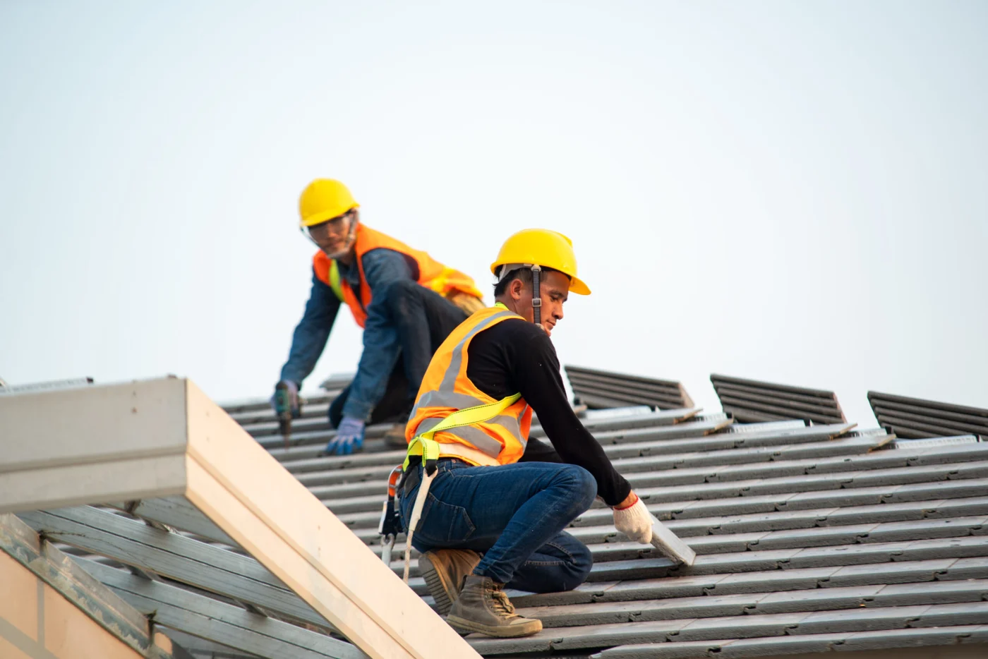 Contractors From Ameritech Services On A Home Installing A New Residential Roof On A Southampton home